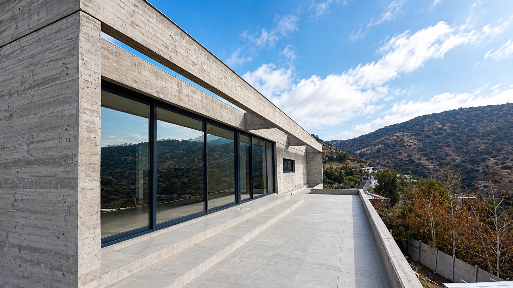 Casa contemporánea de hormigón con vista al valle · Manquecura, Lo Barnechea — miniatura 14